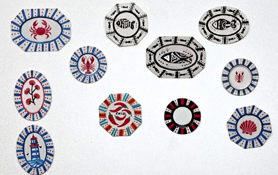Miniature plates decorated with Coco's crab, lobster, fish and shell waterslide decals