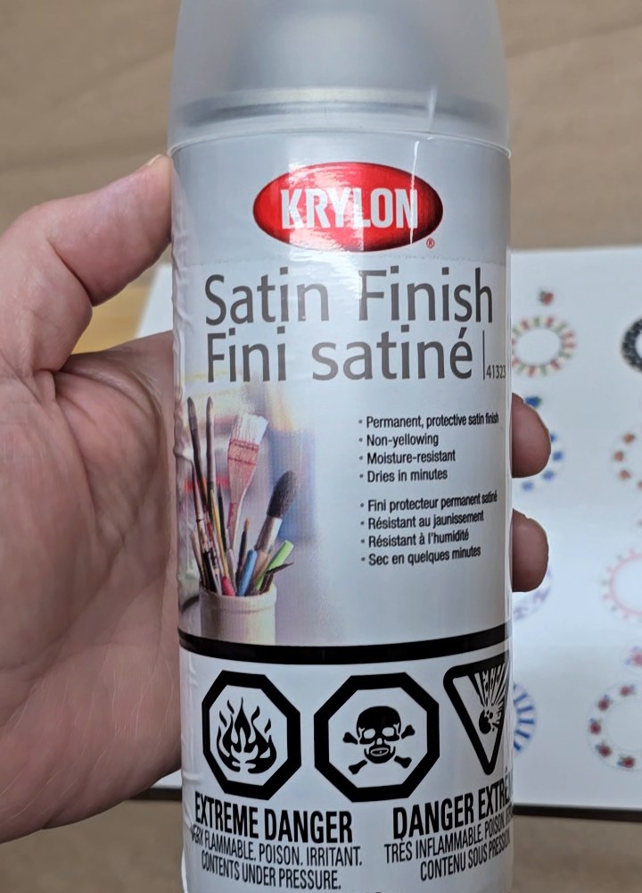 The Krylon Satin Finish spray can used to seal Coco's printed decal sheet